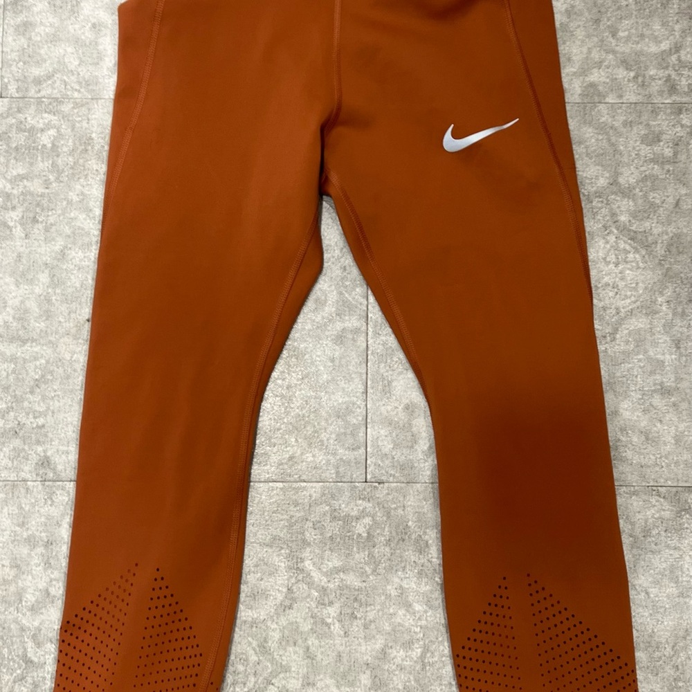Nike Dri-FIT Rust Orange High-Waist Leggings with White Swoosh